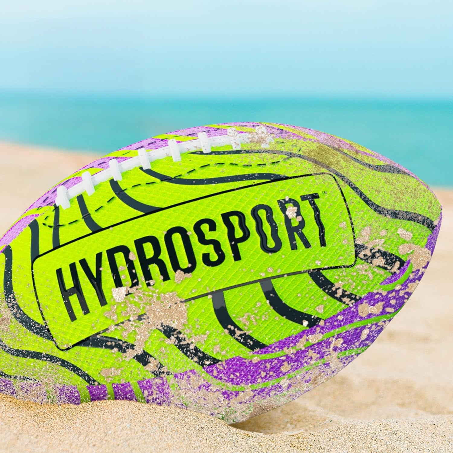 Football in the sand on Santa Rosa Beach, Florida